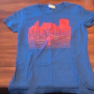 Genuine Merchandise Blue T-Shirt